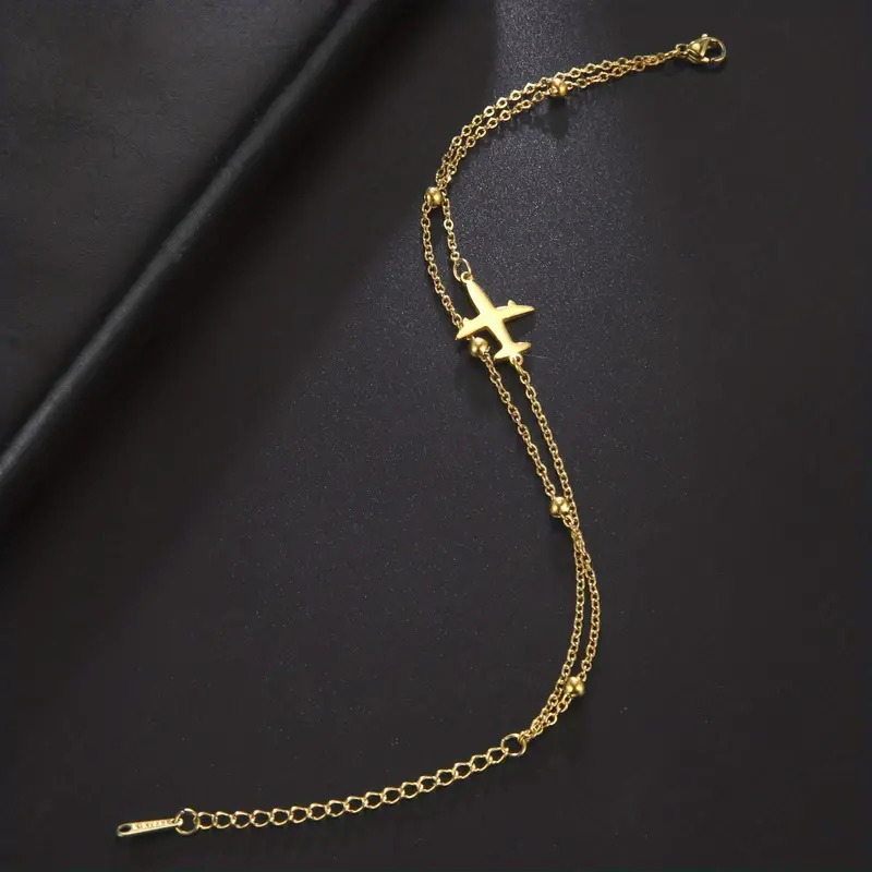 Náramek letadlo (ocel) - zlatá