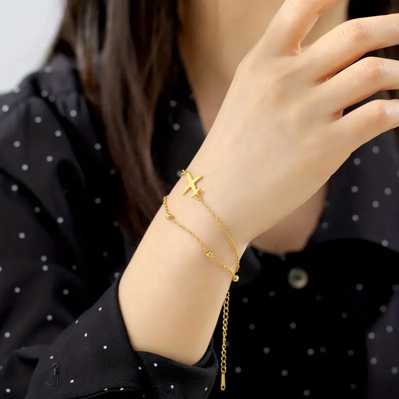 Náramek letadlo (ocel) - zlatá