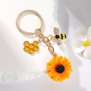 Klíčenka včela a med a květina